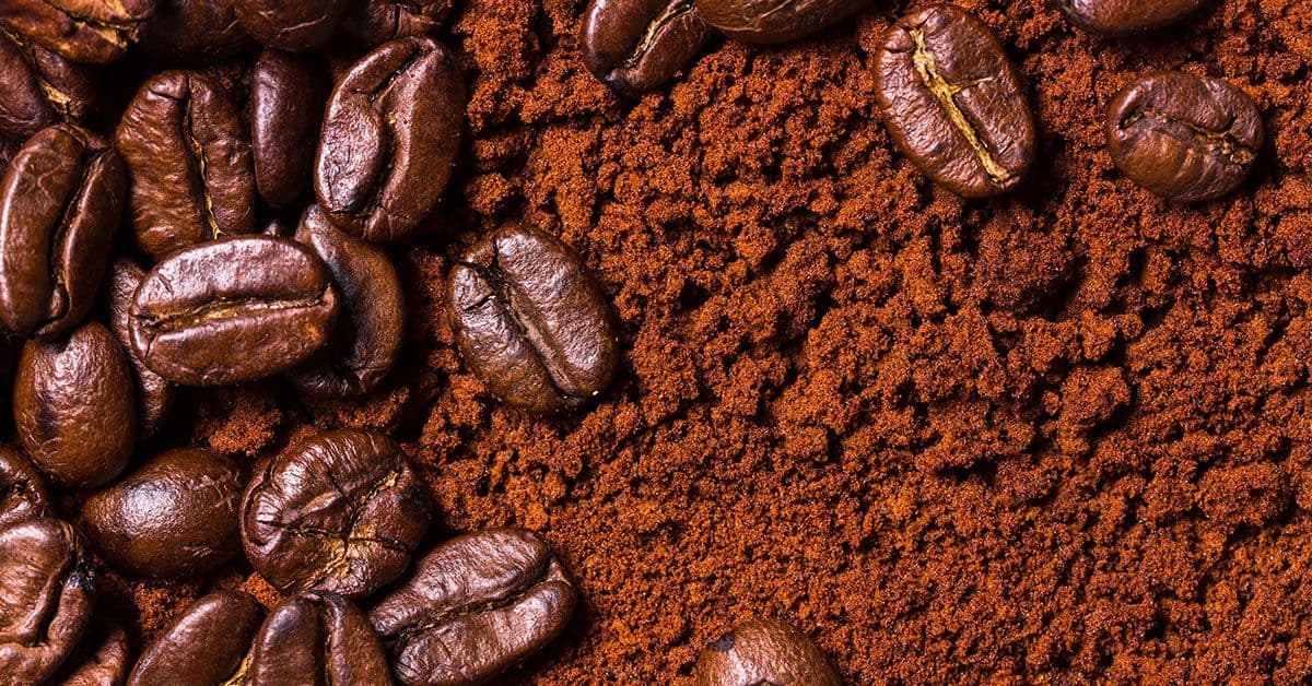 Coffee beans on a red background.