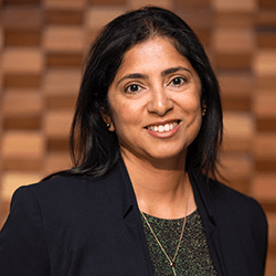 A headshot of Madhu Bhaskaran