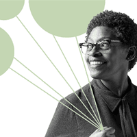 librarian holding balloons