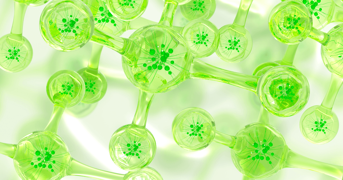 3D rendering of a translucent green molecular network made of interconnected spherical nodes with internal particle-like details, linked by cylindrical bonds.