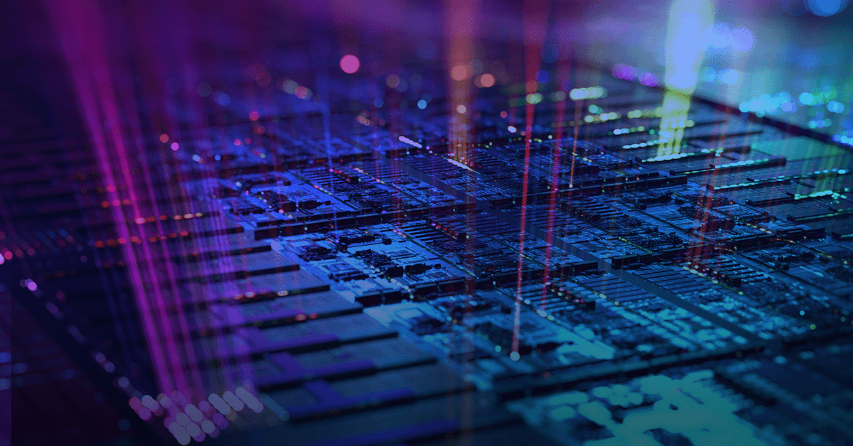 A close-up view of a computer microchip with intricate circuits and purple-blue lighting effects.