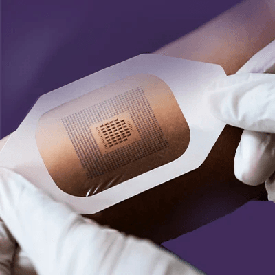An image of a transparent wearable patch with a microchip design for innovative treatment.